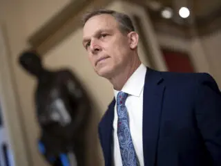 Rep. Scott Perry, R-PA, a senior member of the conservative House Freedom Caucus, heads to the chamber for last votes at the Capitol in Washington, Friday, Jan. 12, 2024.
