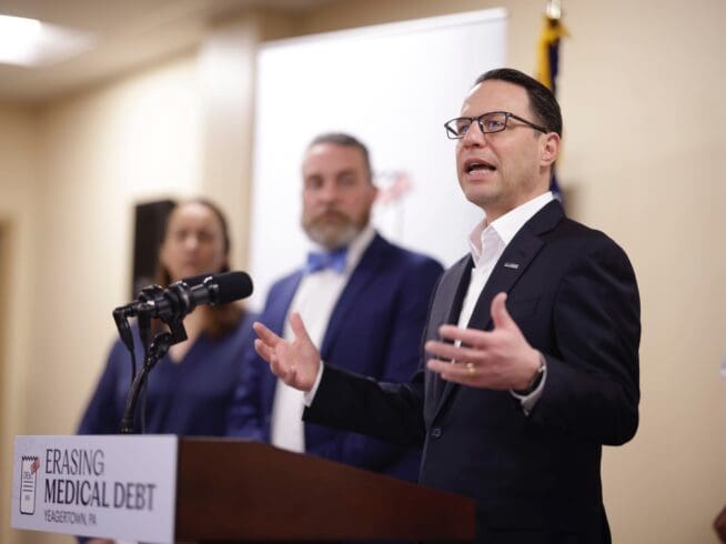 Gov. Josh Shapiro speaks about his proposal to erase medical debt for some Pennsylvanians during a press conference at the Lewistown Community Health Center in Mifflin County on April 2, 2024.