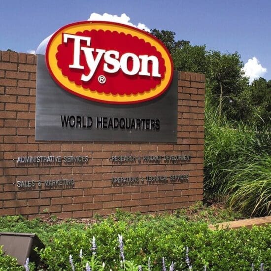 In this July 30, 2001, file photo, a sign marks the entrance to Tyson Foods headquarters in Springdale, Ark. (AP Photo/April L. Brown, File)