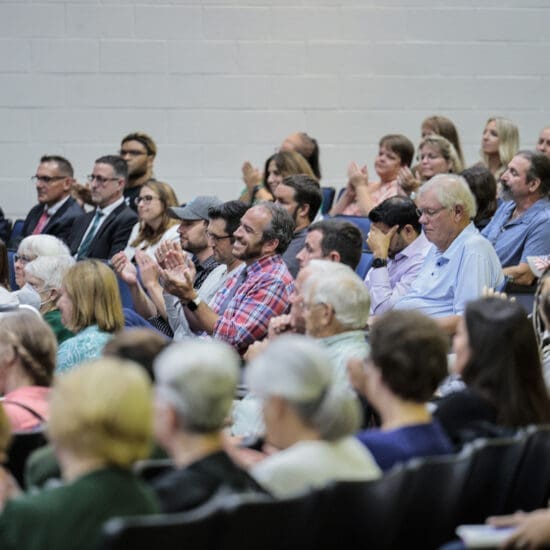 Parents, residents and teachers applaud as they listen to speakers against the curriculum change during the Pennridge school board on Monday, Aug. 28, 2023 in Pennridge, Pennsylvania.