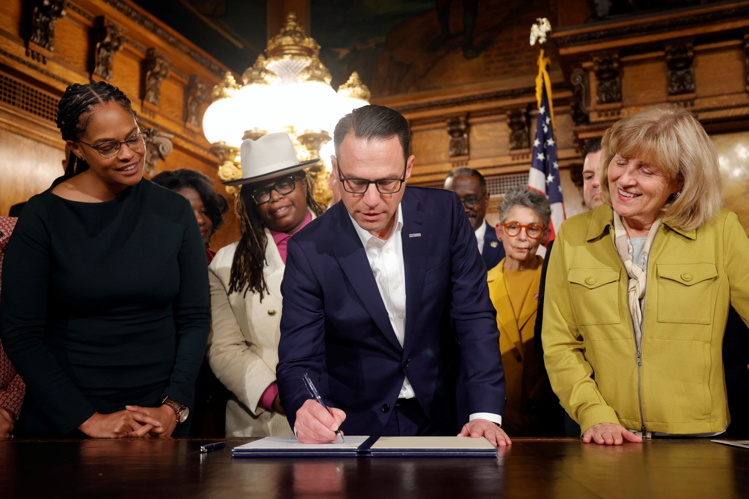 Gov. Josh Shapiro joins lawmakers for a ceremonial signing of legislation meant to reduce maternal morbidity and mortality rates in Pennsylvania.