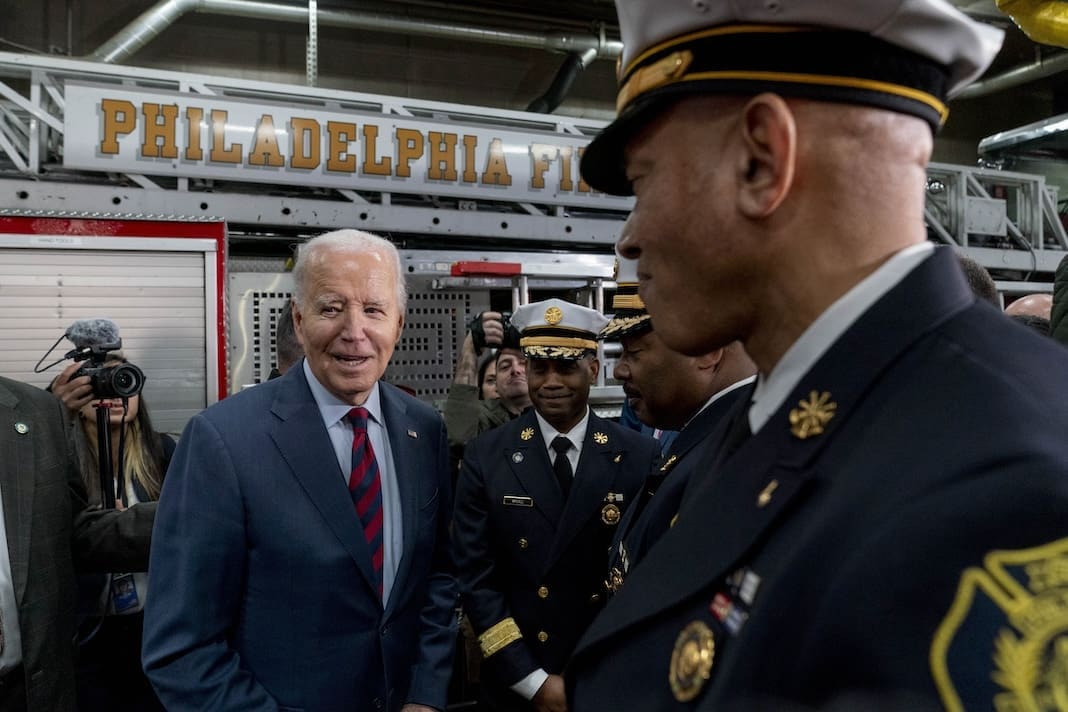 President Joe Biden greets firefighters in the audience after speaking at Engine 13 in Philadelphia, Monday, Dec. 11, 2023, for an event recognizing that the city of Philadelphia is receiving a 22.4 million dollar SAFER Grant, that enables the Philadelphia Fire Department to reopen three fire companies. (AP Photo/Andrew Harnik)