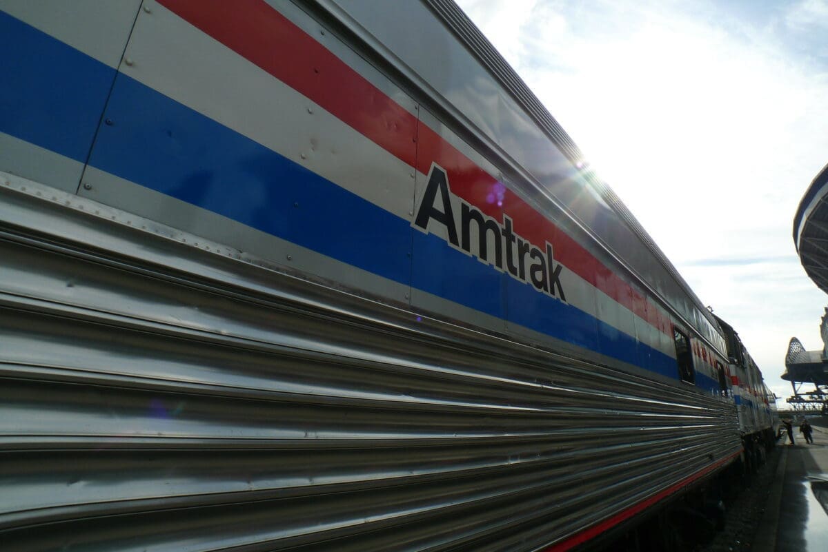 Close up of the "Amtrak" paint on an Amtrak train car.