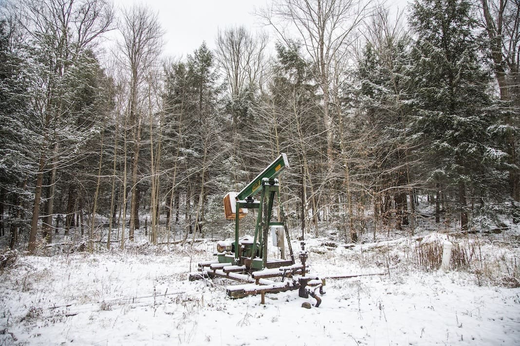 This Nov. 13, 2019 photo shows part of an abandoned oil drilling project in the Allegheny National Forest in Pennsylvania. In the last three years, two companies have abandoned about 3,000 wells in and around the forest, walking away from cleanup responsibilities that could cost the state tens of millions of dollars. (Andrew Rush/Pittsburgh Post-Gazette via AP)