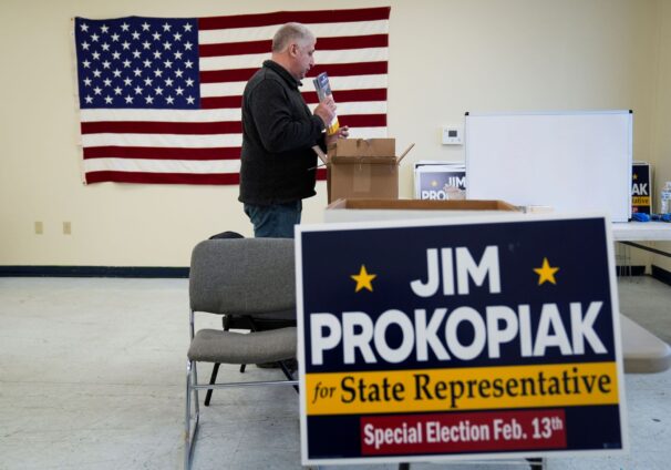 Jim Prokopiak, Democratic nominee for a Bucks County special election to fill a vacant Pennsylvania state House seat, picks up flyers to go door knocking from his election headquarters in Fairless Hills, Pa., Tuesday, Jan. 30, 2024.